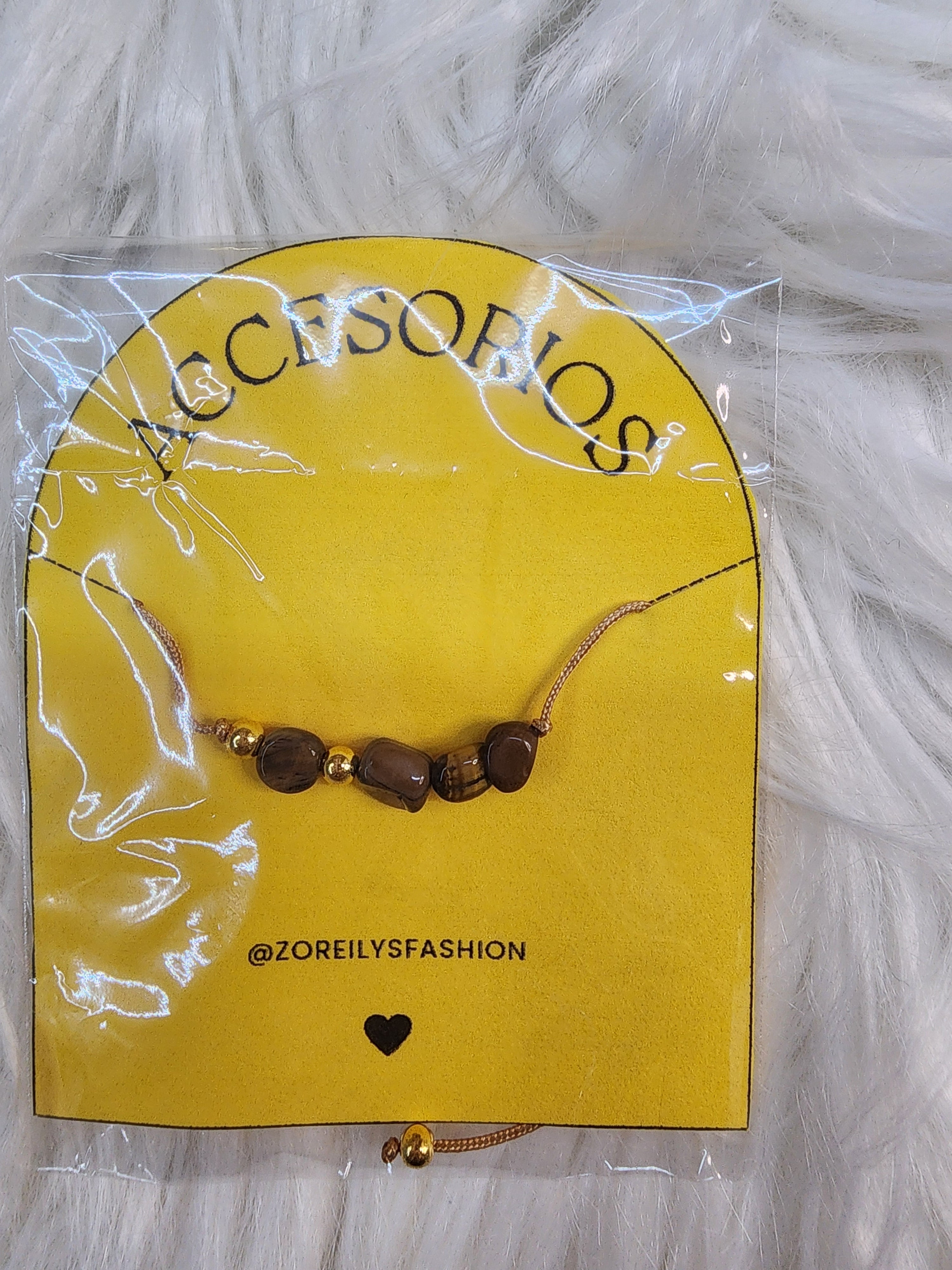 Pulsera de Hilo Ajustable con Cuentas Translúcidas (El toque sutil perfecto)