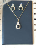 Set de Joyería Elegante: Collar y Pendientes con Cristal Negro y Halo de Brillos